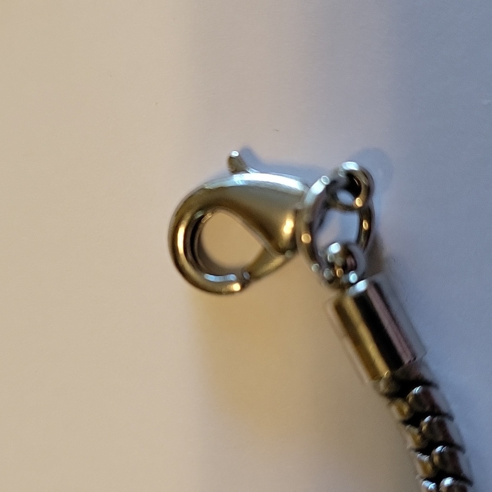 Silver chain with silver, gold, hematite & crystal beads adorn this bracelet - Picture 3 of 6